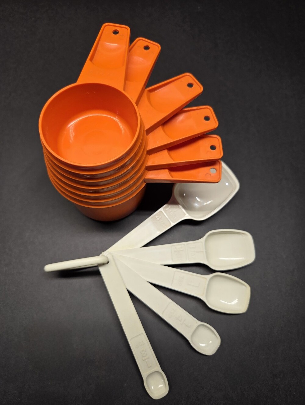 70s Tupperware Orange 6pc  Measuring Cups, White 5pc Measuring Spoons D Ring Vtg